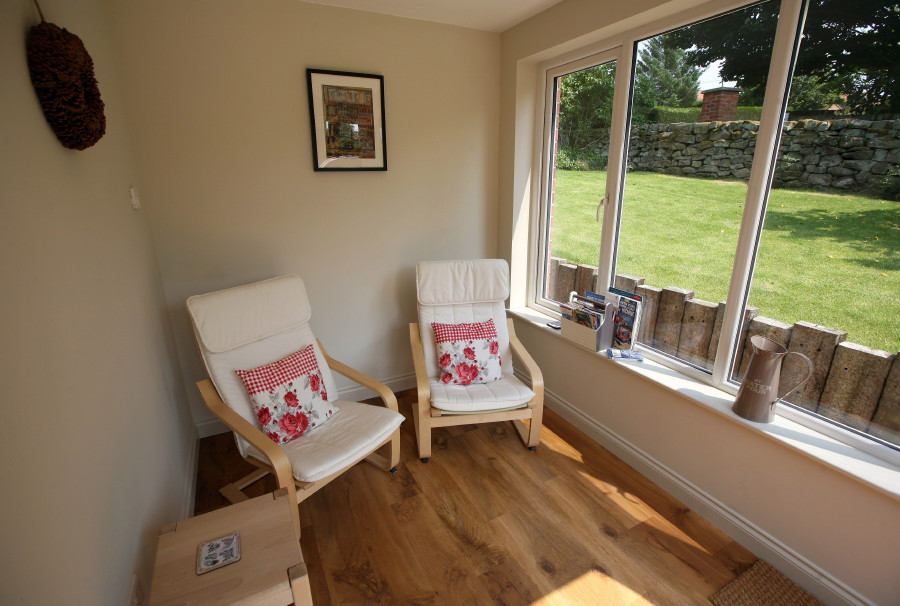 relaxing chairs in garden room